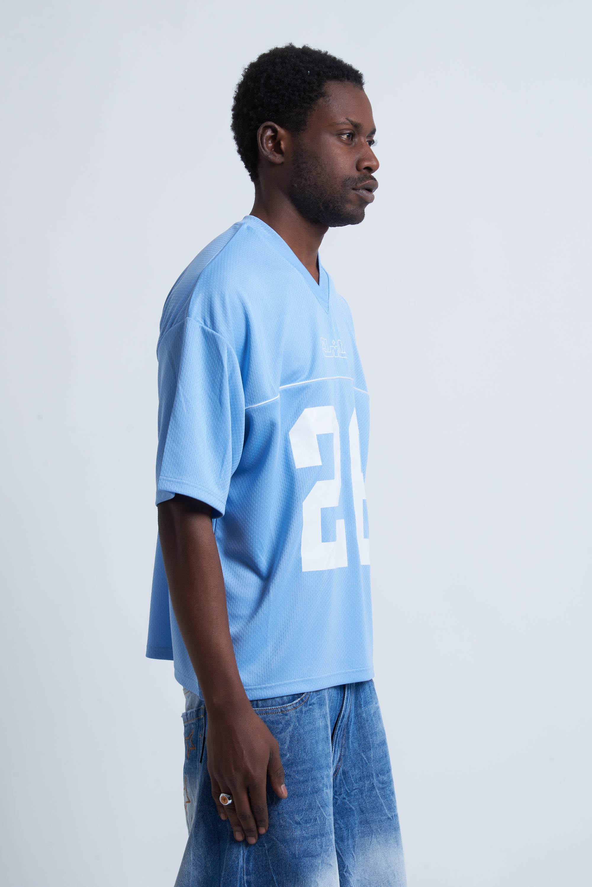 HOCKEY TEE ARABIC SKY