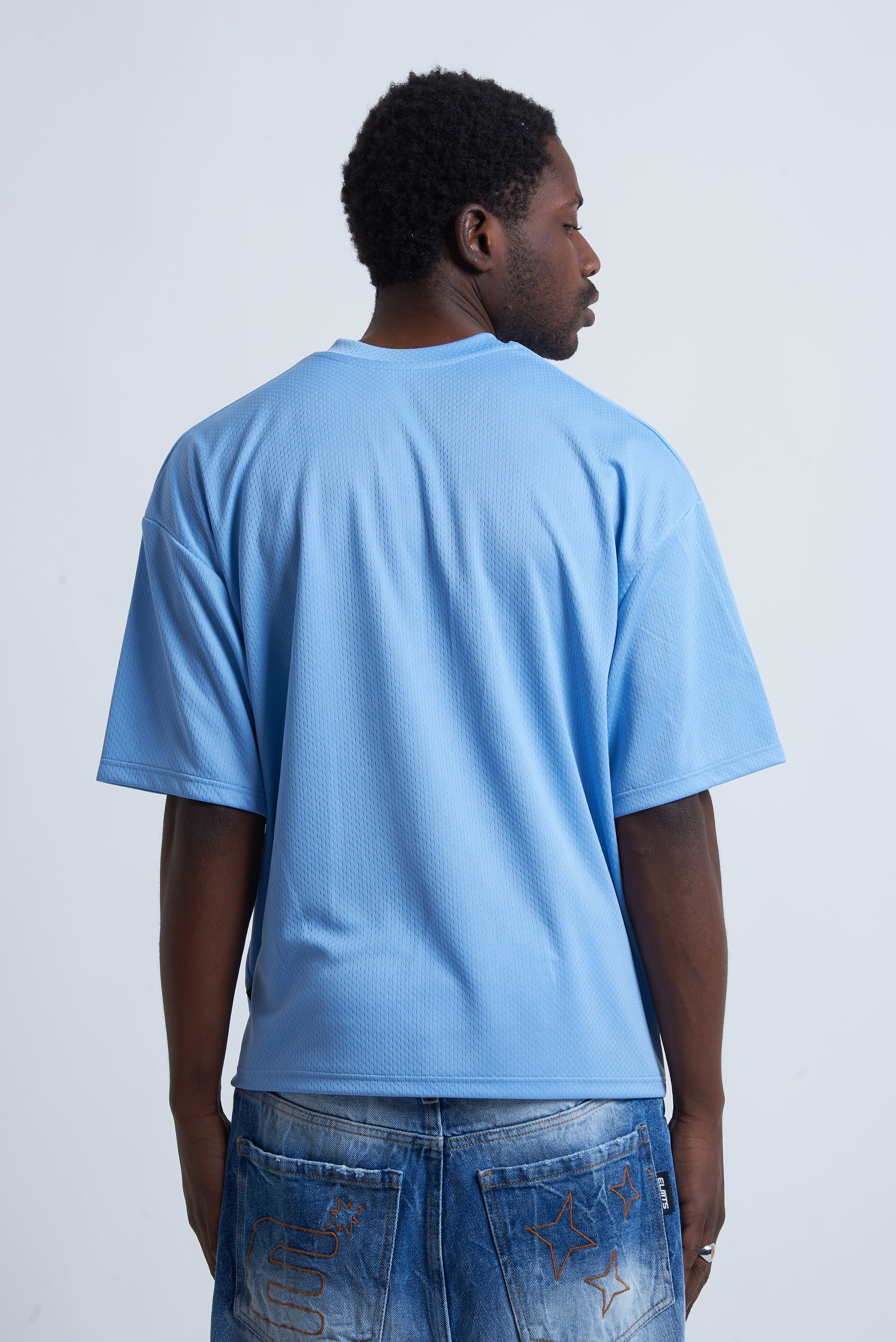 HOCKEY TEE ARABIC SKY