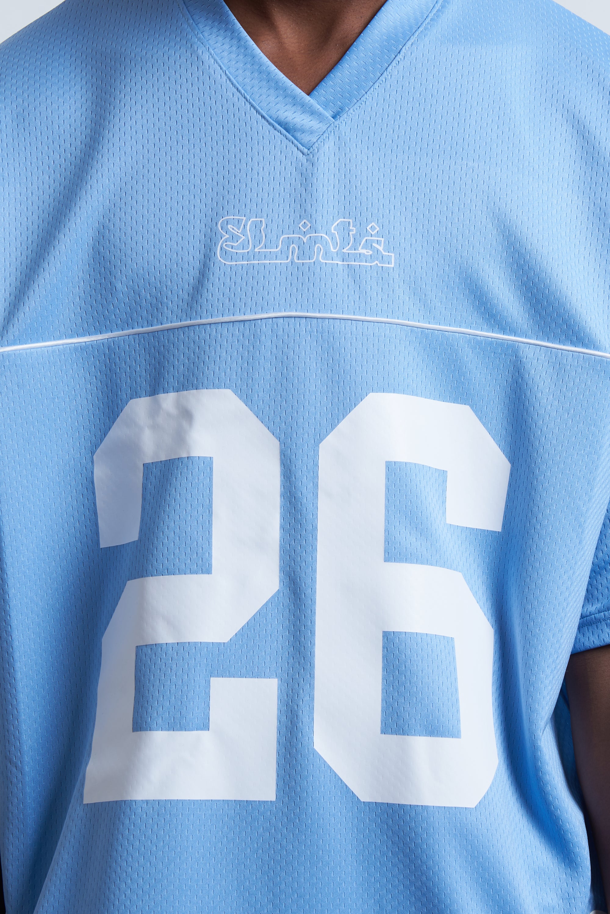 HOCKEY TEE ARABIC SKY